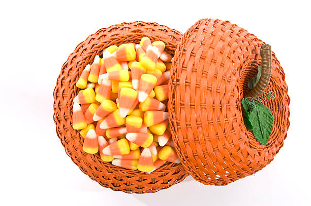 istock Candy Corn in Halloween or Thanksgiving Basket 111954843
