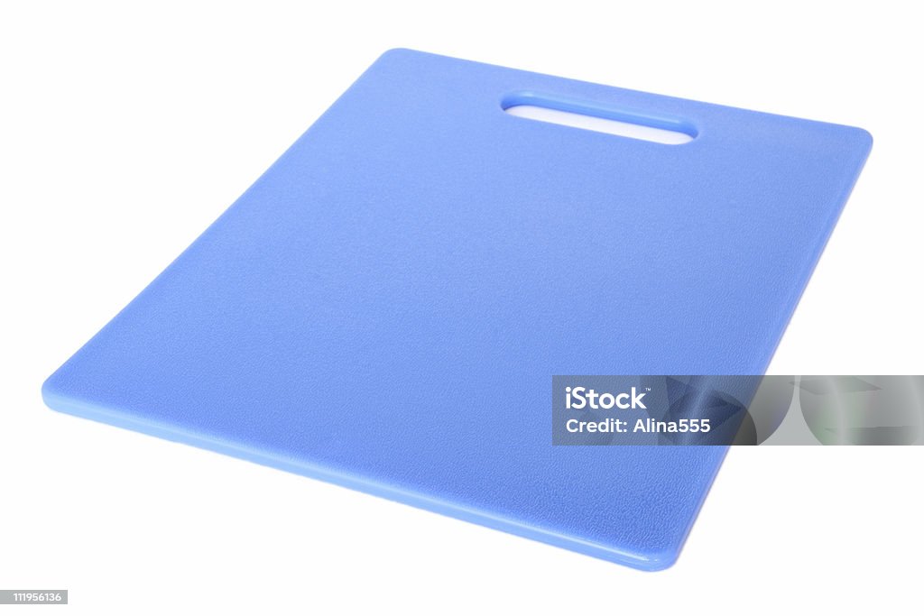 Plastic blue cutting board on white  Cutting Board Stock Photo