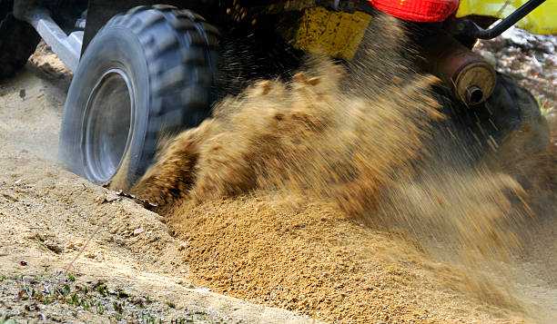 istock ATV Rooster Tail Tears Up Sand Hill 111962047