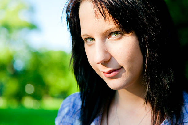 istock young woman in the park 111962126