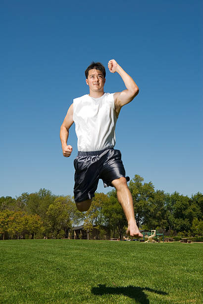 istock Handsome young bi racial man jumping outdoors 111962847