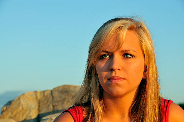 istock Comtemplative Woman at Sunrise 111963939