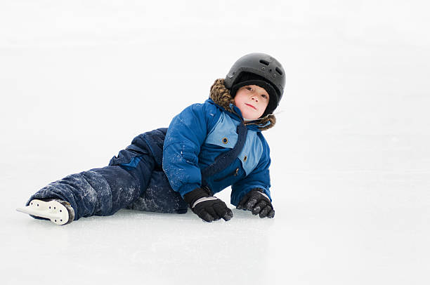 istock young boy skating on an outdoor rink 111964780