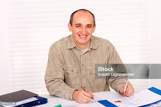 Smiling And Writing Stock Photo - Download Image Now - Adult, Adults Only, Balding