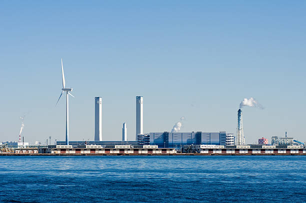 istock Wind turbine and a thermal power generation 111973416