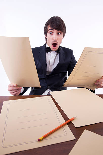 istock Businessman stressed in his office, many documents on the desk 111973704
