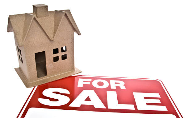 istock House for Sale Isolated on White 111980325