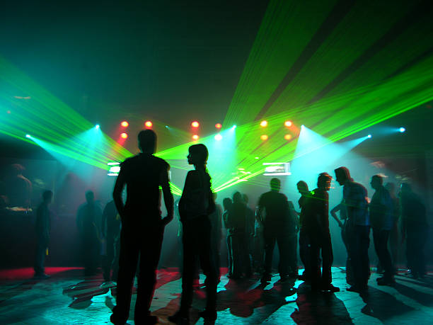 istock People at party with bright lights 111982573
