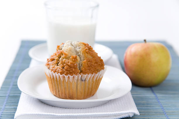 istock Blueberry muffin milk and an apple 111996151