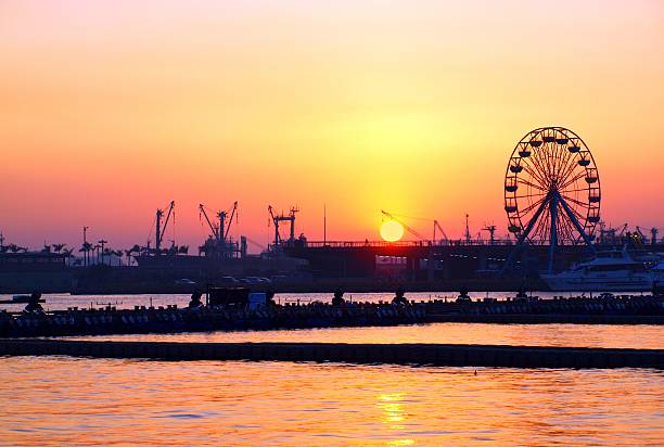 istock Kaohsiung Harbor Sunset with Ferris Wheel 112040638