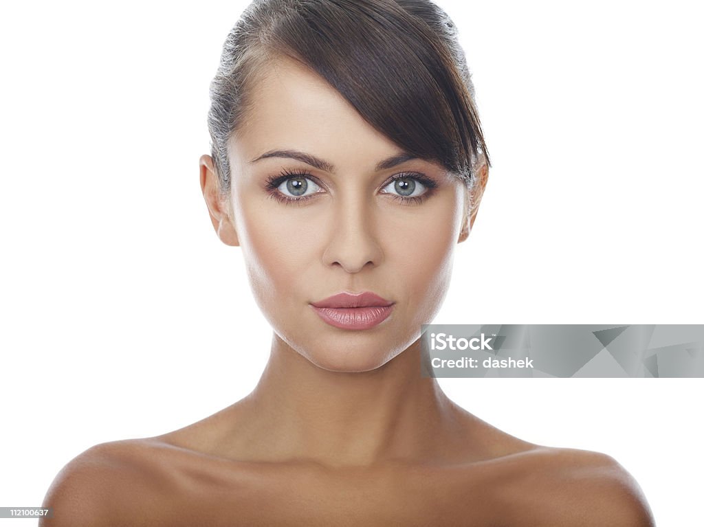Portrait of beautiful woman with makeup on looking at camera Portrait of beautiful and sexy woman on white Adult Stock Photo