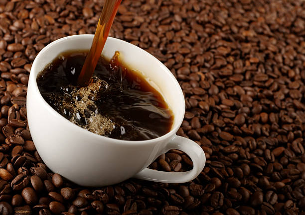 Pouring coffee stock photo