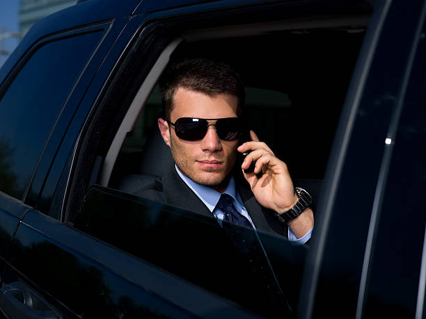 istock A businessman in the back of a car 112105109