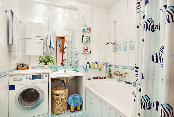 istock Modern small bathroom in blue colors wide angle view 112146294
