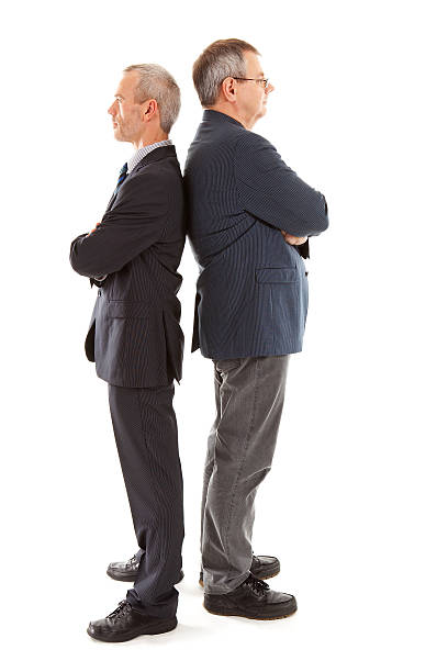 istock two business man back to each other 112148623
