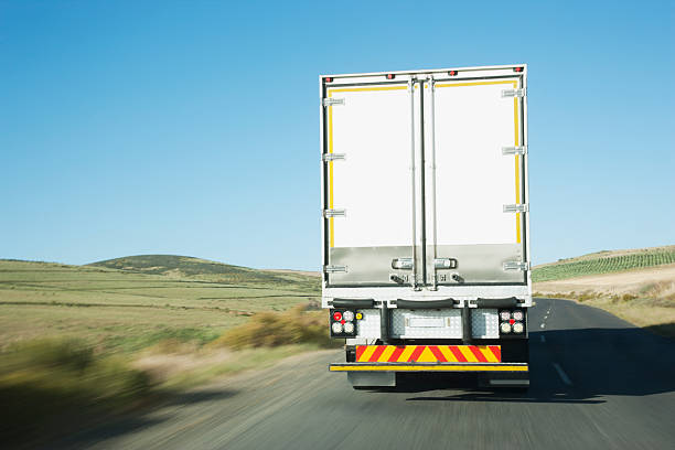 Semi-truck driving on remote rode  truck photos stock pictures, royalty-free photos & images