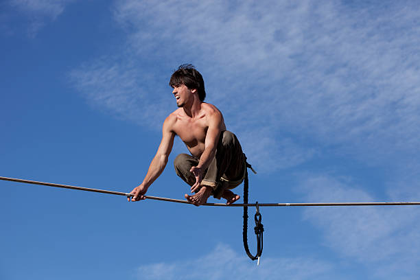 Man Balancing on Highline stock photo