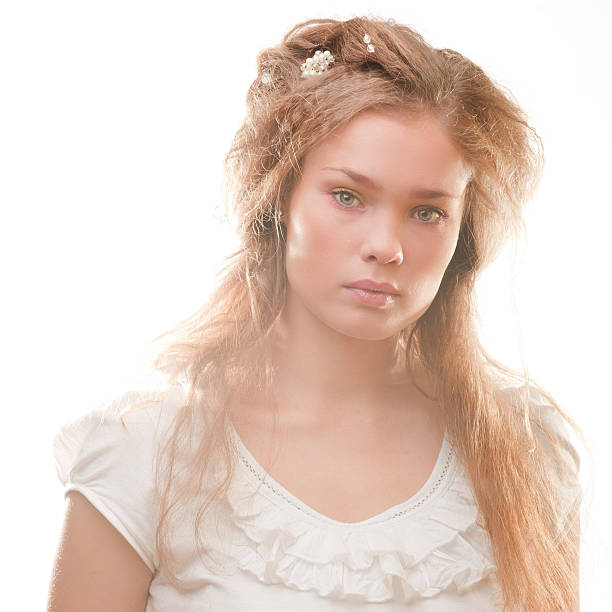 Bright fashion portrait of beautiful young woman on white stock photo