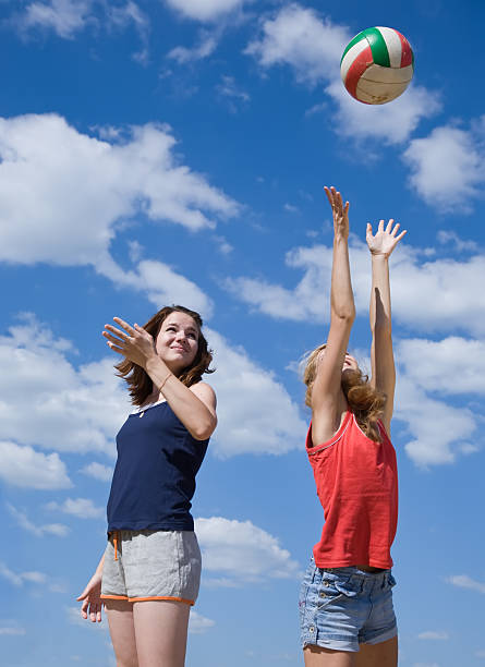 istock girls playing volleyball 112255434