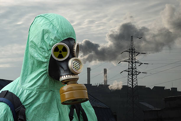 istock man in gas mask on smoky background 112267763