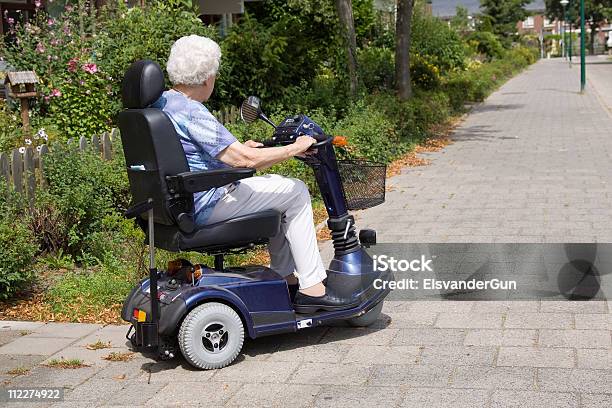 Mobility Scooter Stock Photo - Download Image Now - Mobility Scooter, Senior Women, Persons with Disabilities