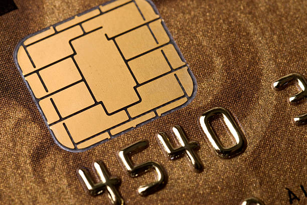 A close-up of a microchip in a credit card stock photo