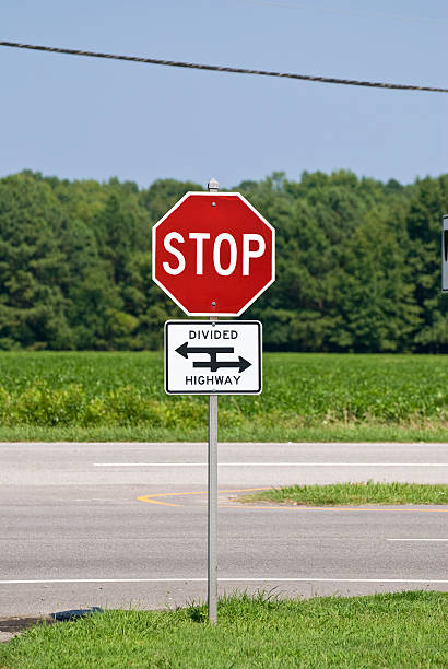 остановка-дорожный знак - one way stop stop sign street стоковые фото и изображения