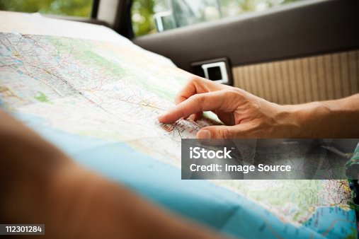 istock Person with a map 112301284
