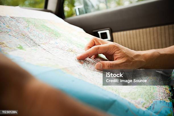 Person With A Map Stock Photo - Download Image Now - Map, Road Trip, Planning