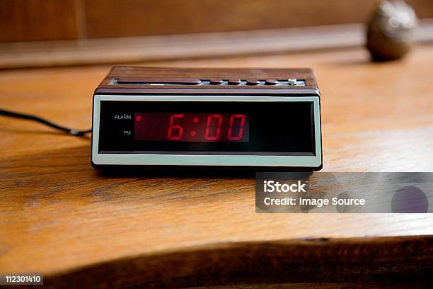 Digital Alarm Clock Showing 600am Stock Photo - Download Image Now - Alarm Clock, Digital Display, Waking up