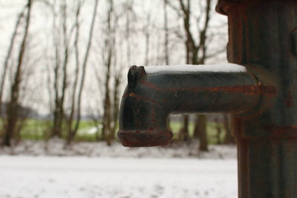 istock Snow on the water pump 1124222386