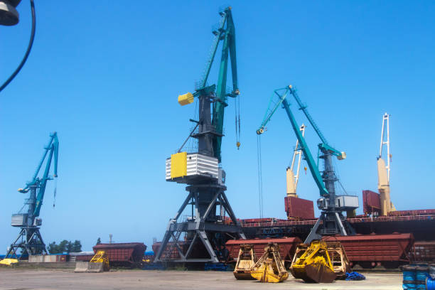 istock Industrial seaport with cargo cranes. Container shipping by sea. 1124224055