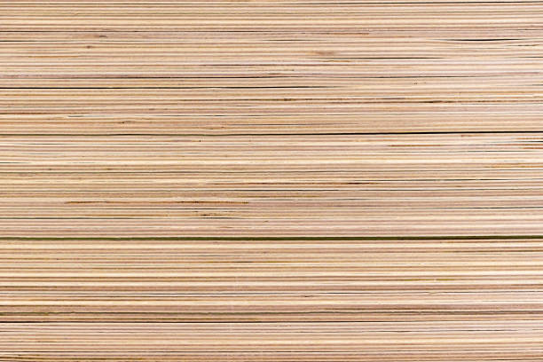 Piled sheets of plywood in a building materials store. Piled sheets of plywood in a building materials store. Plywood stock pictures, royalty-free photos & images