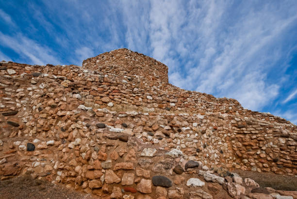 Tuzigoot National Monument preserves a 2- to 3-story 110 room pueblo dwelling on the top of a ridge near the Verde River. The pueblo is a complex of stone rooms that were built along the spine of a natural outcrop. The Southern Sinaqua people built this complex between 1100 and 1425AD. Tuzigoot National Monument is near Clarkdale, Arizona, USA.