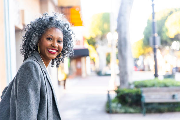 istock A Carefree Black Woman Looking Back Over her Shoulder 1124226540