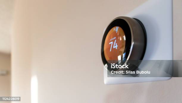 Smart Home Thermostat Stock Photo - Download Image Now - Thermostat, Smart Thermostat, Home Automation