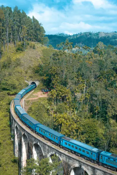 Photo of The Nine Arches Bridge Demodara is one of the iconic bridges in Sri Lanka. Morning mist in Ella.