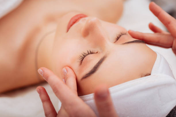 istock Beautiful nice young woman closing her eyes 1124229347