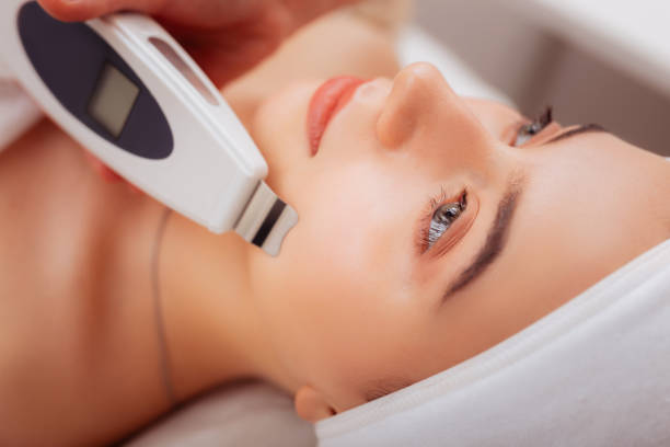 istock Nice beautiful woman having her skin cleaned 1124229405