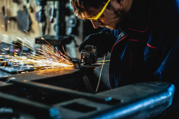 istock Worker Use Electric Grinder Cutting Metal 1124229799