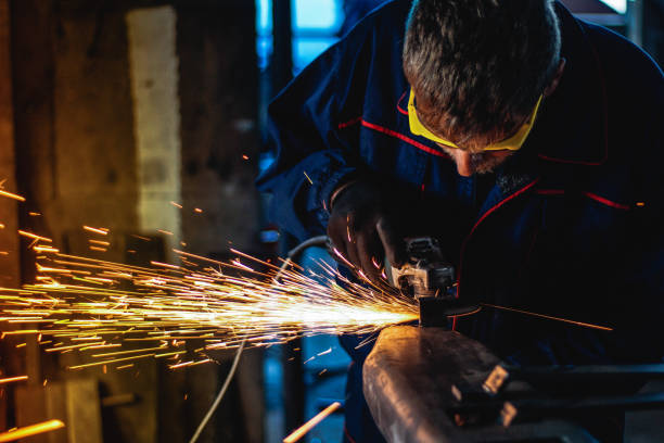 istock Worker Use Electric Grinder Cutting Metal 1124229829