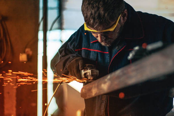 istock Worker Use Electric Grinder Cutting Metal 1124229834