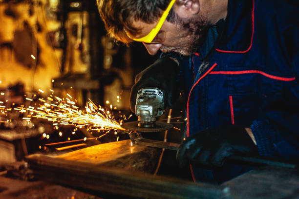istock Worker Use Electric Grinder Cutting Metal 1124229930