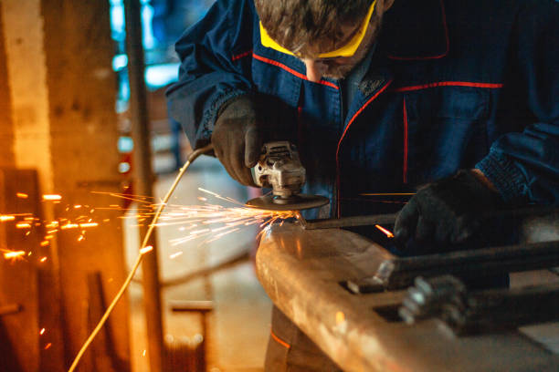 istock Worker Use Electric Grinder Cutting Metal 1124230210