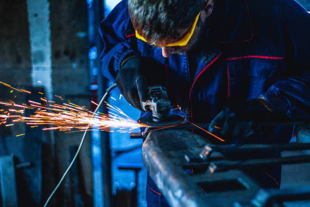 istock Worker Use Electric Grinder Cutting Metal 1124230297
