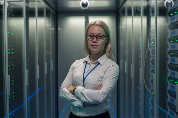 istock Serious engineer in corridor of data center 1124233475