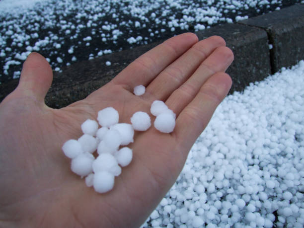 istock Giant hailstones fall by sidewalk on Scottish Island 1124235238