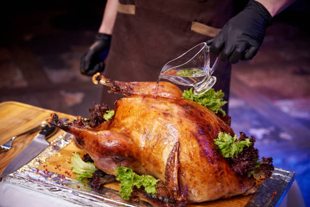 istock Appetizing baked turkey on a tray in a restaurant. 1124236304