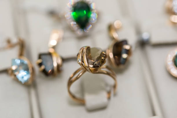 istock Jewellery with gemstones at showcase in store 1124236498