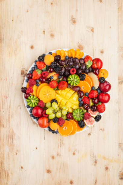 istock Raw fruits berries platter 1124236875